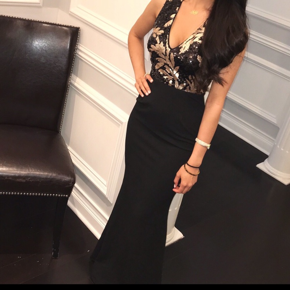 Elegant Lulu’s black gown with sequin detail!